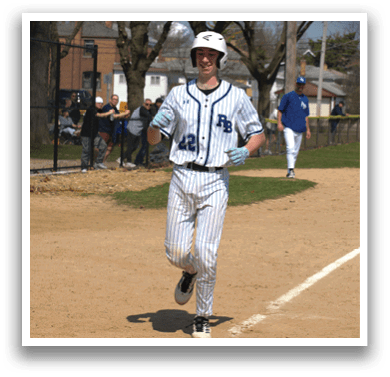 A baseball player running on the field. Description generated by AI