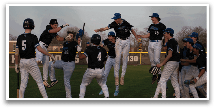 A group of baseball players celebrating on the field. Description generated by AI