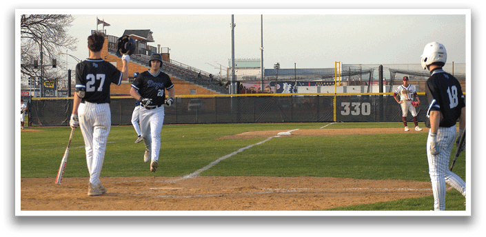 A baseball game is in progress with players on the field. Description generated by AI