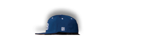 A man wearing a blue hat and black jacket. Description generated by AI