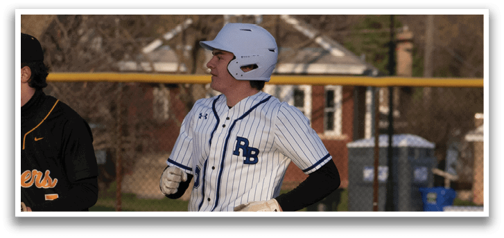 A baseball player running to a base. Description generated by AI