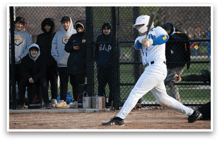 A baseball player is swinging a bat. Description generated by AI