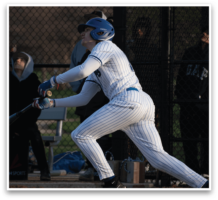A baseball player running to first base. Description generated by AI