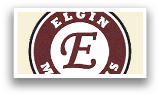 A red and white logo for Elgin Maroons. Description generated by AI