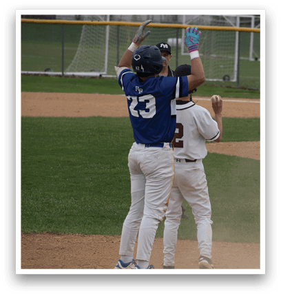 Two baseball players are on the field. Description generated by AI