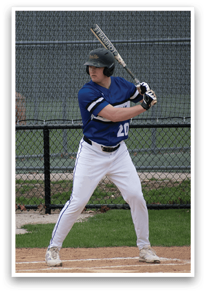 A baseball player in a blue and white uniform is swinging a bat. Description generated by AI