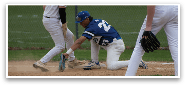 A baseball player slides into a base. Description generated by AI