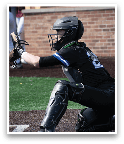 A baseball player wearing a helmet and knee pads. Description generated by AI