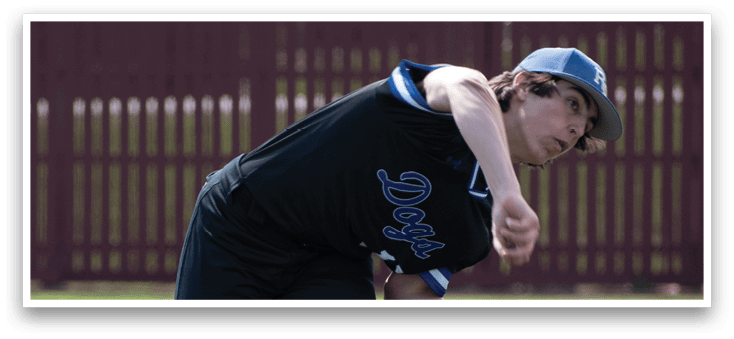 A baseball player in a black shirt and black pants is pitching a ball. Description generated by AI