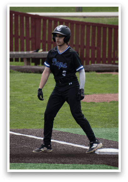 A baseball player wearing a black shirt and black pants. Description generated by AI