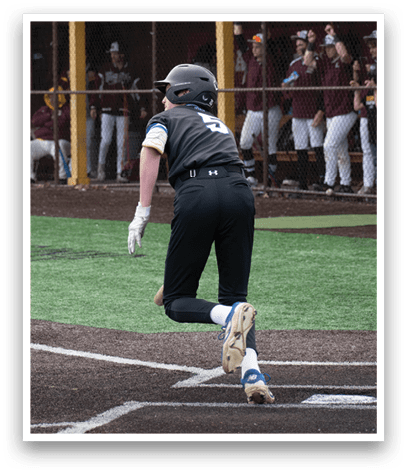 A baseball player is running to first base. Description generated by AI