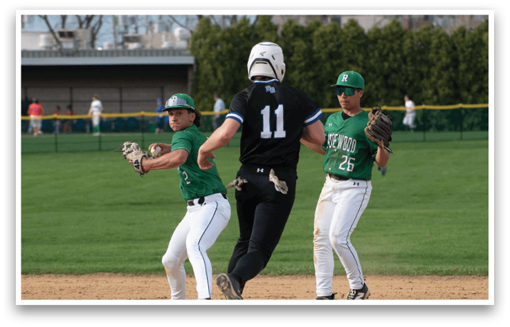 A baseball game in progress with players on the field. Description generated by AI