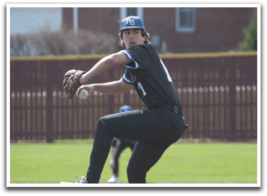 A baseball player in a black shirt and black pants is pitching a ball. Description generated by AI