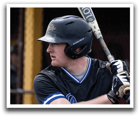 A baseball player wearing a black shirt and helmet. Description generated by AI