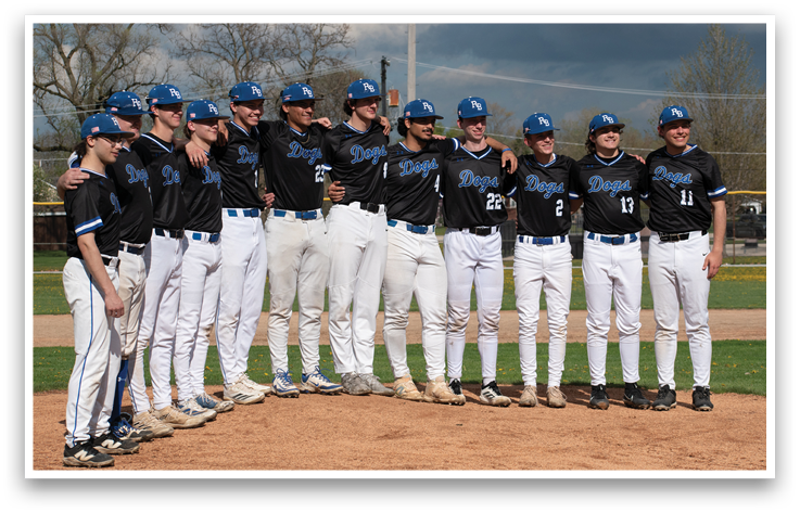 Baseball players wearing black and blue uniforms. Description generated by AI