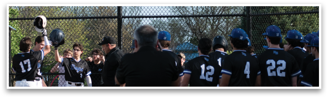 A baseball player is swinging a bat at a ball. Description generated by AI