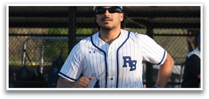 A baseball player running on the field. Description generated by AI