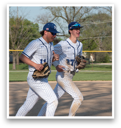 Two baseball players running on a field. Description generated by AI