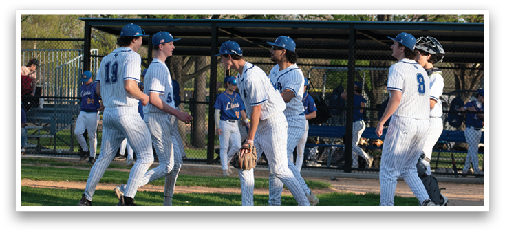A group of baseball players walking on a field. Description generated by AI