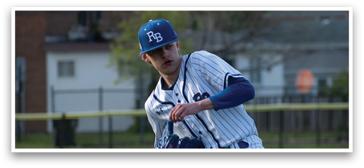A baseball player wearing a blue and white uniform. Description generated by AI