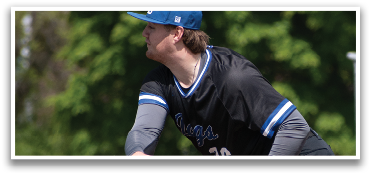 A baseball player in a black shirt and blue hat is pitching a ball. Description generated by AI