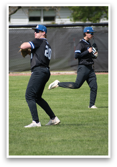 Two baseball players running on a field. Description generated by AI