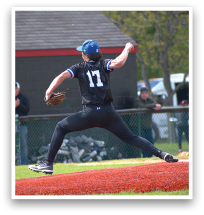 A baseball player in a black shirt and blue hat is throwing a ball. Description generated by AI