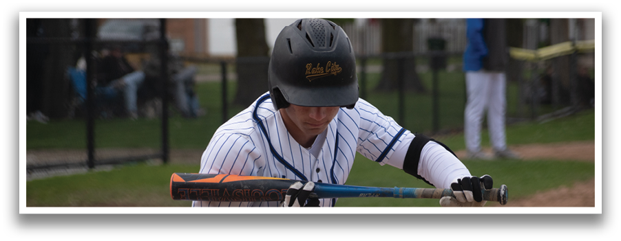 A baseball player is swinging a bat. Description generated by AI