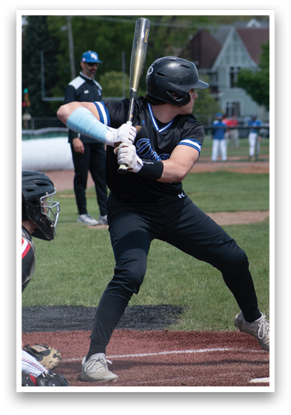 A baseball player is swinging a bat at a ball. Description generated by AI