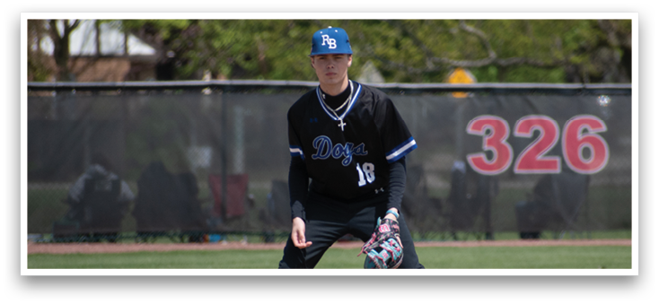 A baseball player wearing a blue helmet and black jersey. Description generated by AI