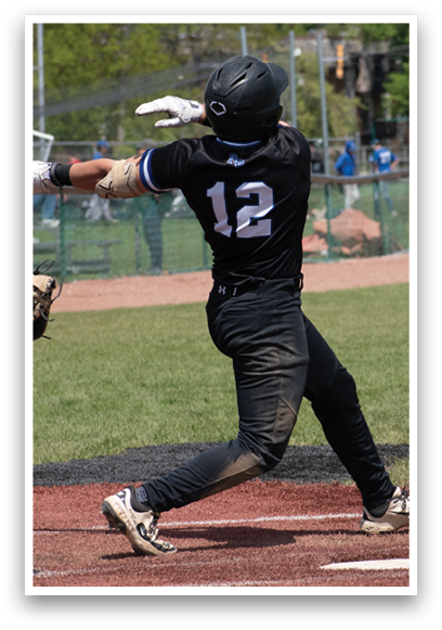 A baseball player is swinging a bat at a ball. Description generated by AI