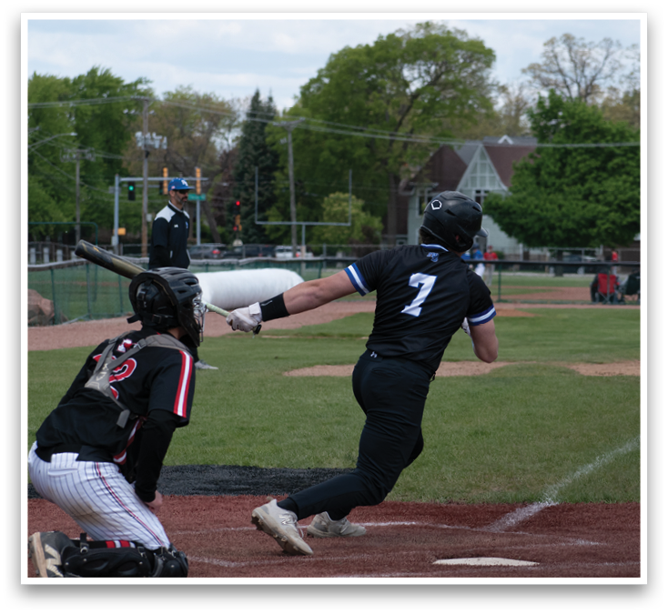 A baseball player is swinging a bat. Description generated by AI