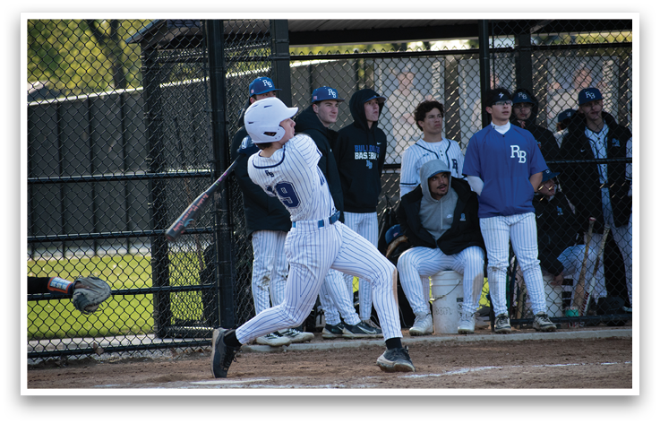 A baseball player is swinging a bat. Description generated by AI
