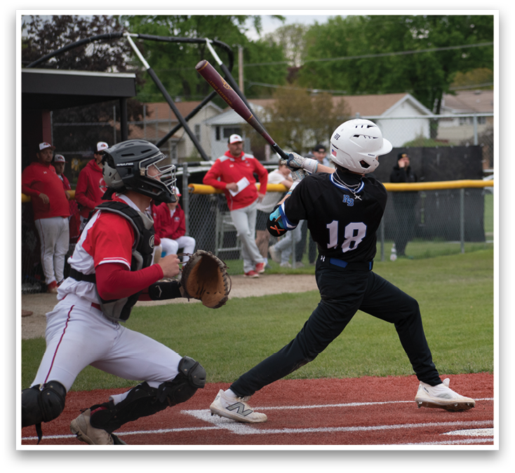 A baseball player is swinging a bat at a ball. Description generated by AI