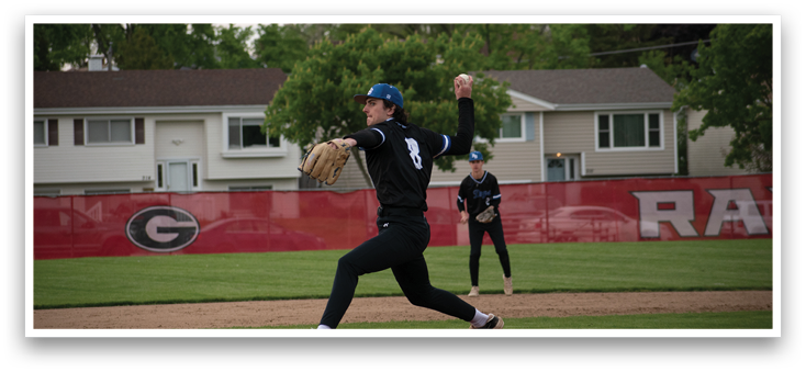A pitcher in a black and blue uniform throws a baseball. Description generated by AI