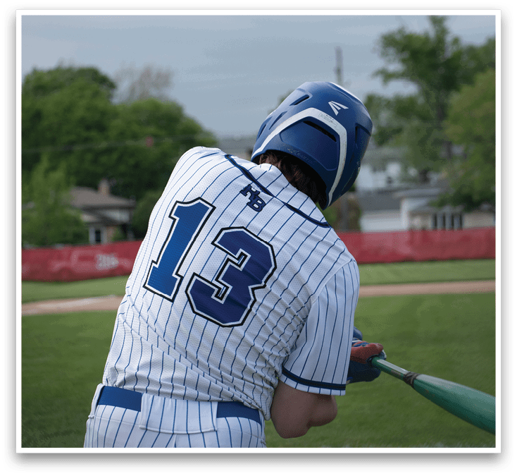 A baseball player wearing a blue and white uniform with the number 13 on the back. Description generated by AI