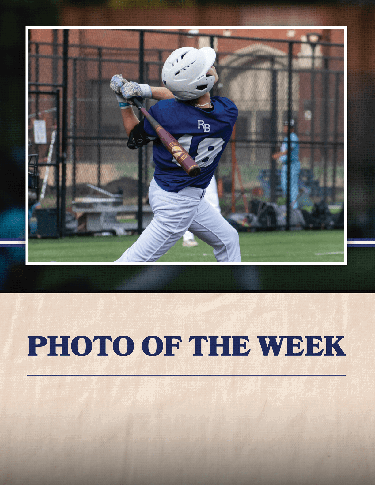 A baseball player in a blue and white uniform swinging a bat. Description generated by AI