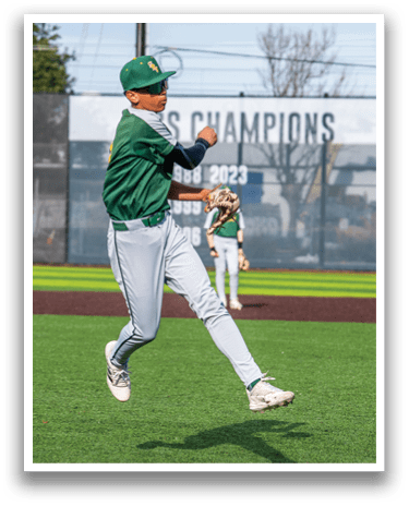 A baseball player in a green and white uniform is in the air, throwing a ball. AI generated content