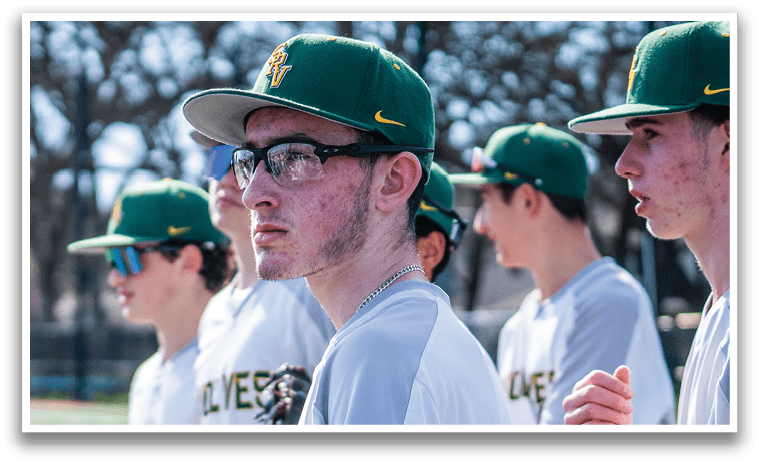 A group of baseball players wearing green and white uniforms are standing on a field. AI generated content