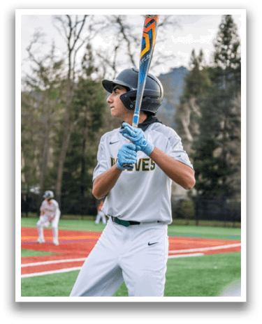 A baseball player in a grey uniform holding a bat, ready to swing. AI generated content