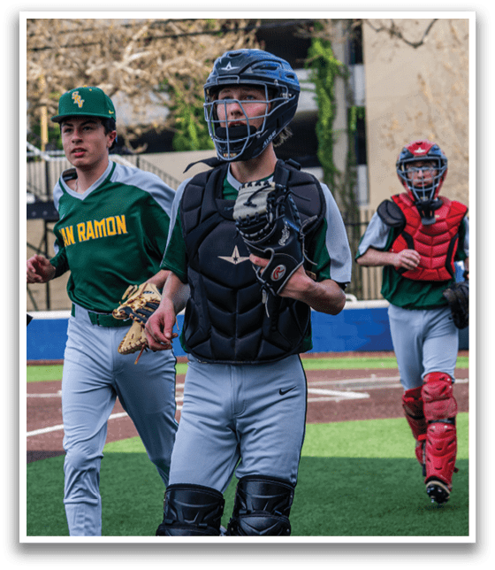 A baseball player wearing a helmet and catcher's gear is holding a baseball mitt. AI generated content