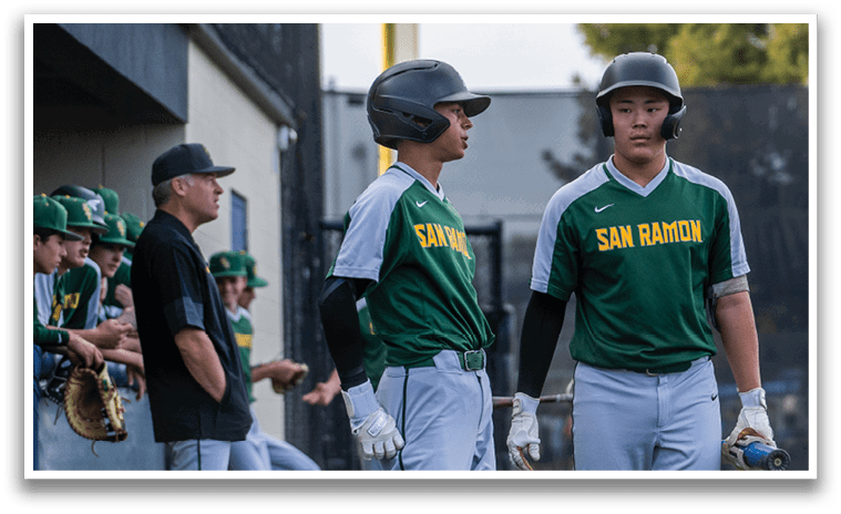 Two baseball players wearing green and gray uniforms stand on a field. AI generated content