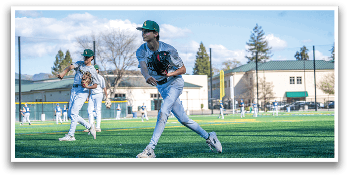 A baseball player in a white uniform is throwing a ball on a field. AI generated content