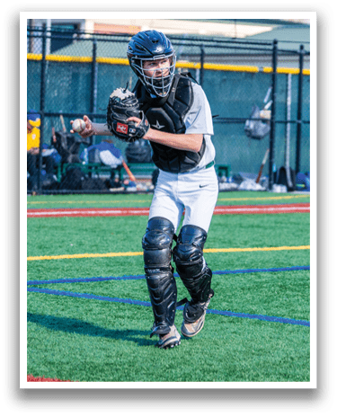A young boy wearing a baseball glove and a helmet is standing on a baseball field. AI generated content