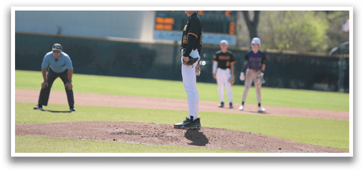 A baseball pitcher is in the middle of throwing a pitch. AI generated content