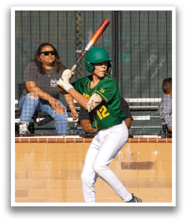 A young boy is swinging a baseball bat, preparing to hit a ball. AI generated content