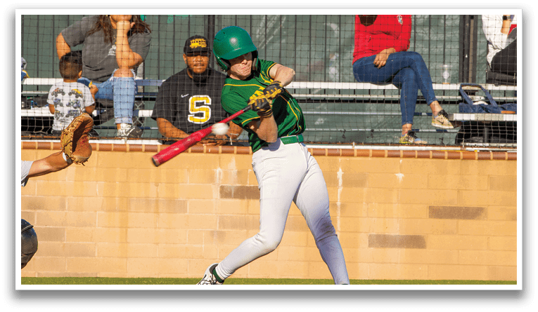 A baseball player in a green helmet and white uniform is swinging a bat during a game. AI generated content