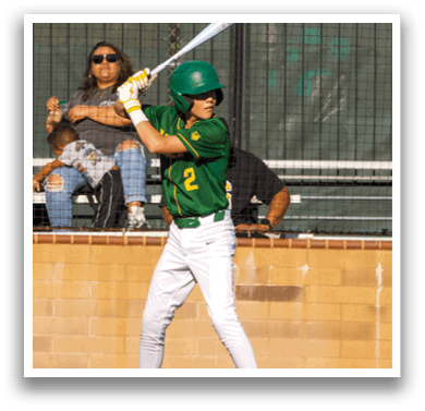 A young boy is swinging a baseball bat, preparing to hit the ball. AI generated content
