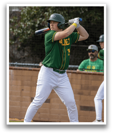 A baseball player in a green and yellow uniform is swinging a bat, preparing to hit a ball. AI generated content