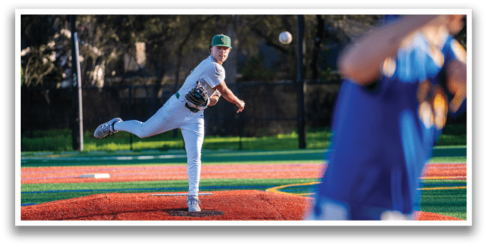 A baseball player in a white uniform is pitching a ball on a field. AI generated content